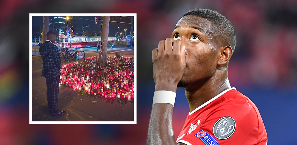 David Alaba andächtig vor einem Kerzenmeer in der Wiener Innenstadt. 