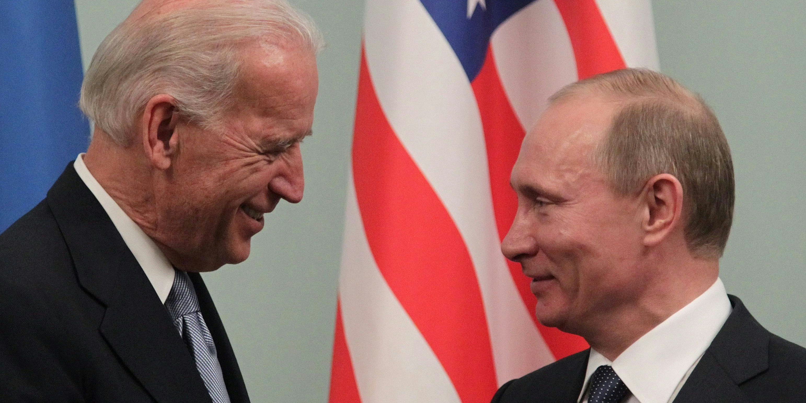 Joe Biden (L) speaks with Russian Prime Minister Vladimir Putin (R) during their meeting in Moscow, Russia 10 March 2011. Joe Biden is