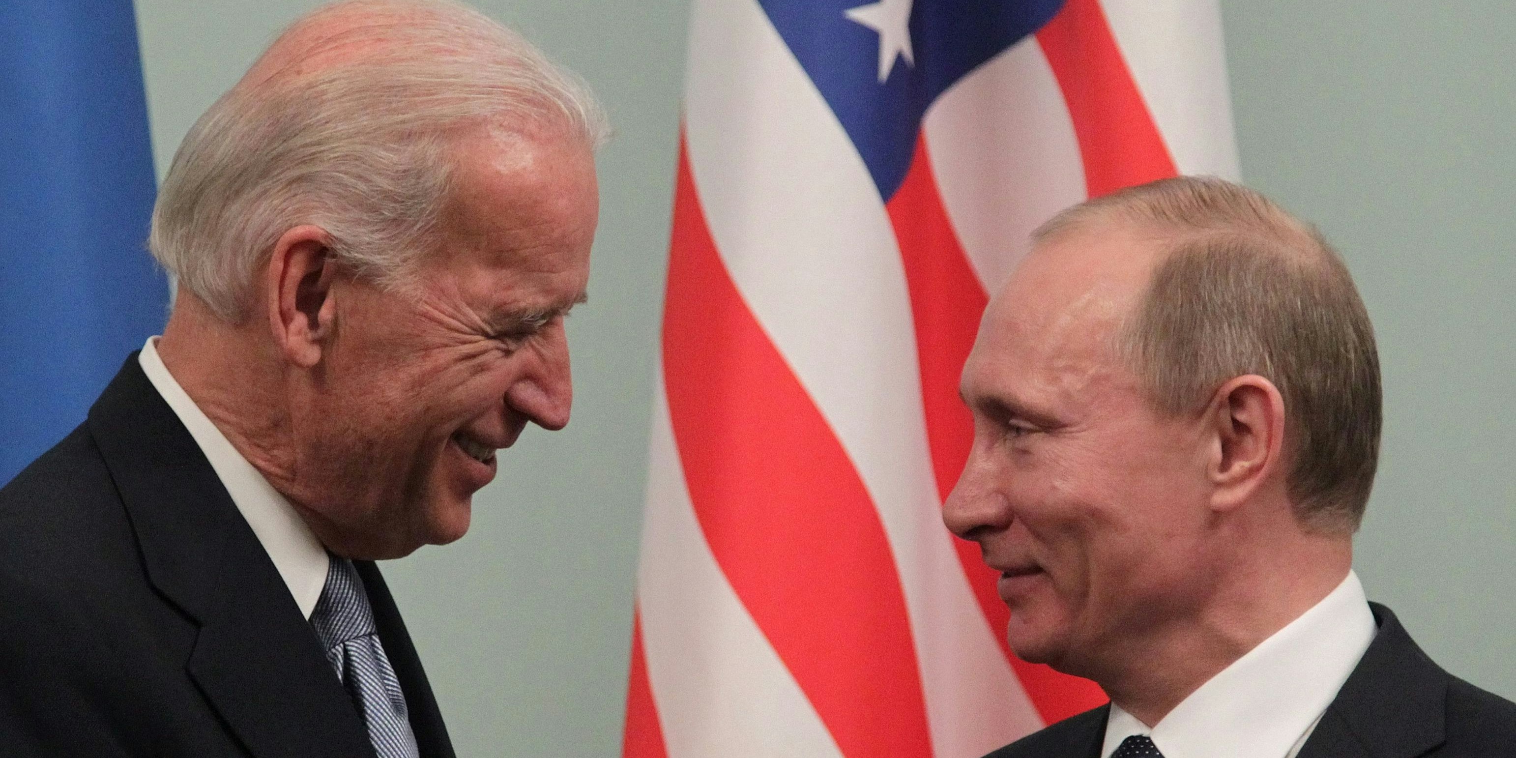 Joe Biden (L) speaks with Russian Prime Minister Vladimir Putin (R) during their meeting in Moscow, Russia 10 March 2011. Joe Biden is