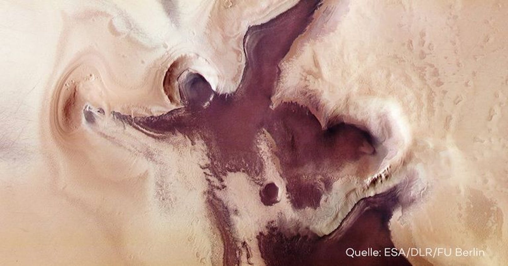 Mit gleich mit zwei festlichen Formen schmückt sich der Mars zu den Festtagen. Ein Engel und ein Herz zieren die Region in der Nähe des Mars-Südpols, wie Aufnahmen der Sonde "Mars Express" zeigen.