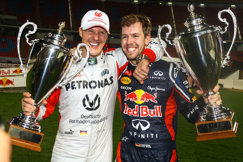 Michael Schumacher mit dem jungen Sebastian Vettel 2012