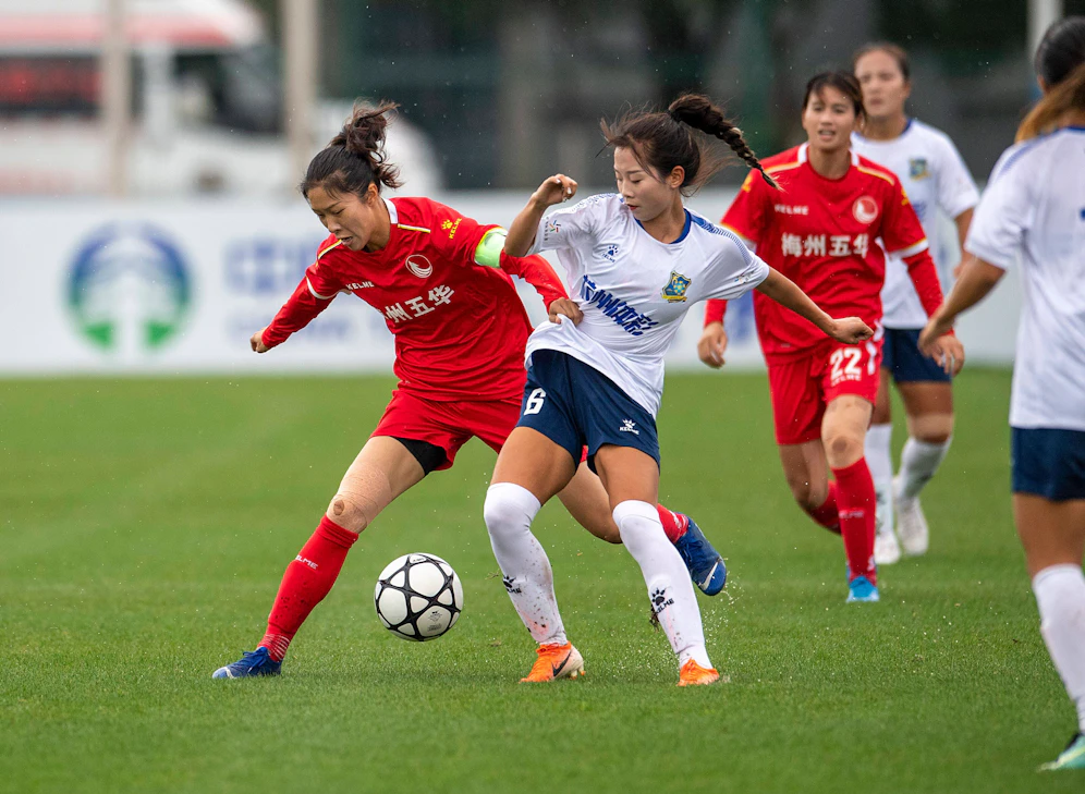 Frauen-Fußball in China: Schwarze Haare sind ein Muss.