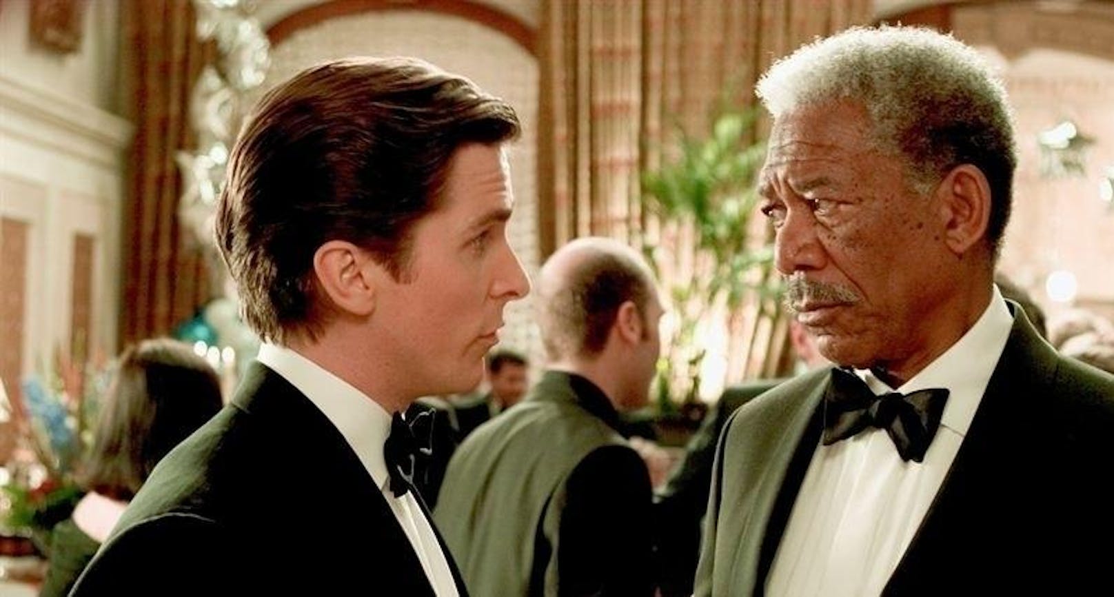 Christian Bale (li.) und Morgan Freeman in "The Dark Knight"