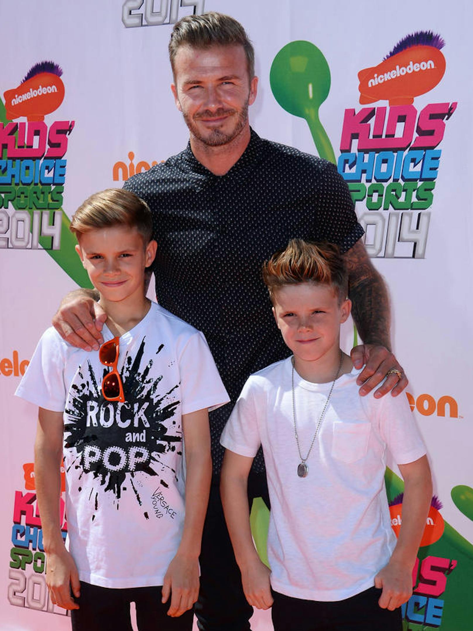 David Beckham bei den Nickelodeons Kids Choice Sports Awards mit seinen Söhnen Romeo und Cruz 2014.