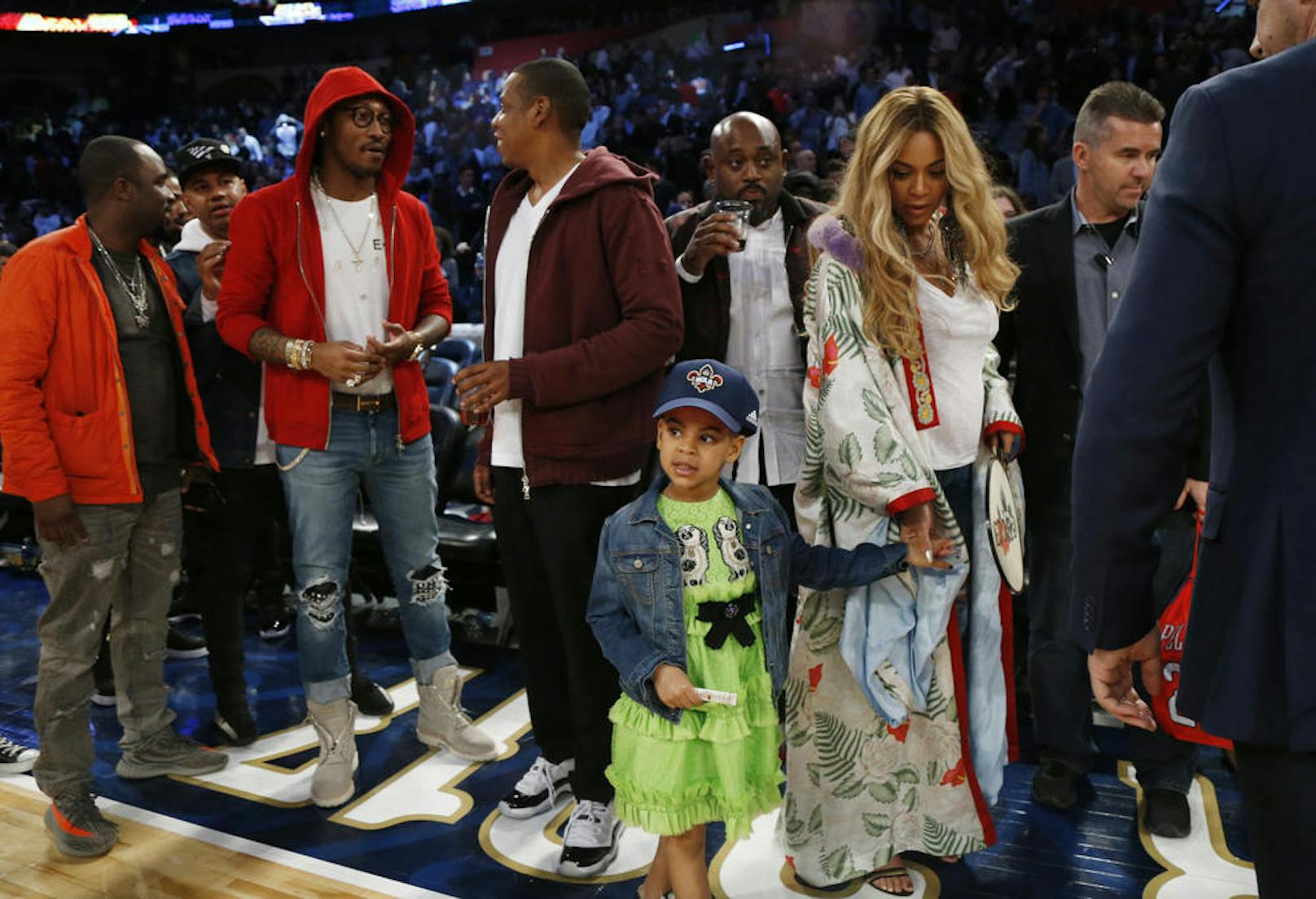 Beyoncé mit Tochter Blue Ivy Carter neben Jay-Z.