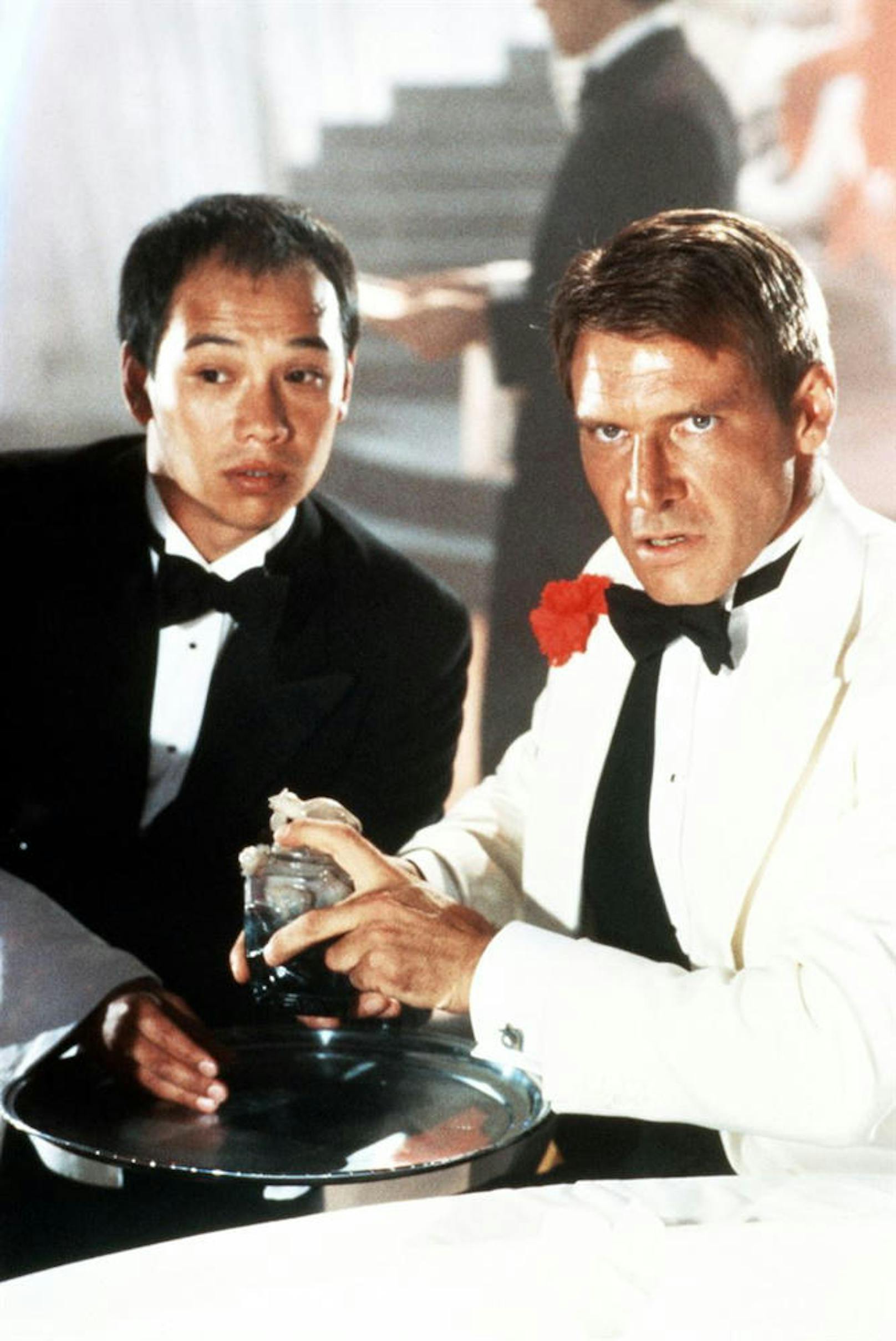 David Yip (li.) und Harrison Ford in "Indiana Jones und der Tempel des Todes"