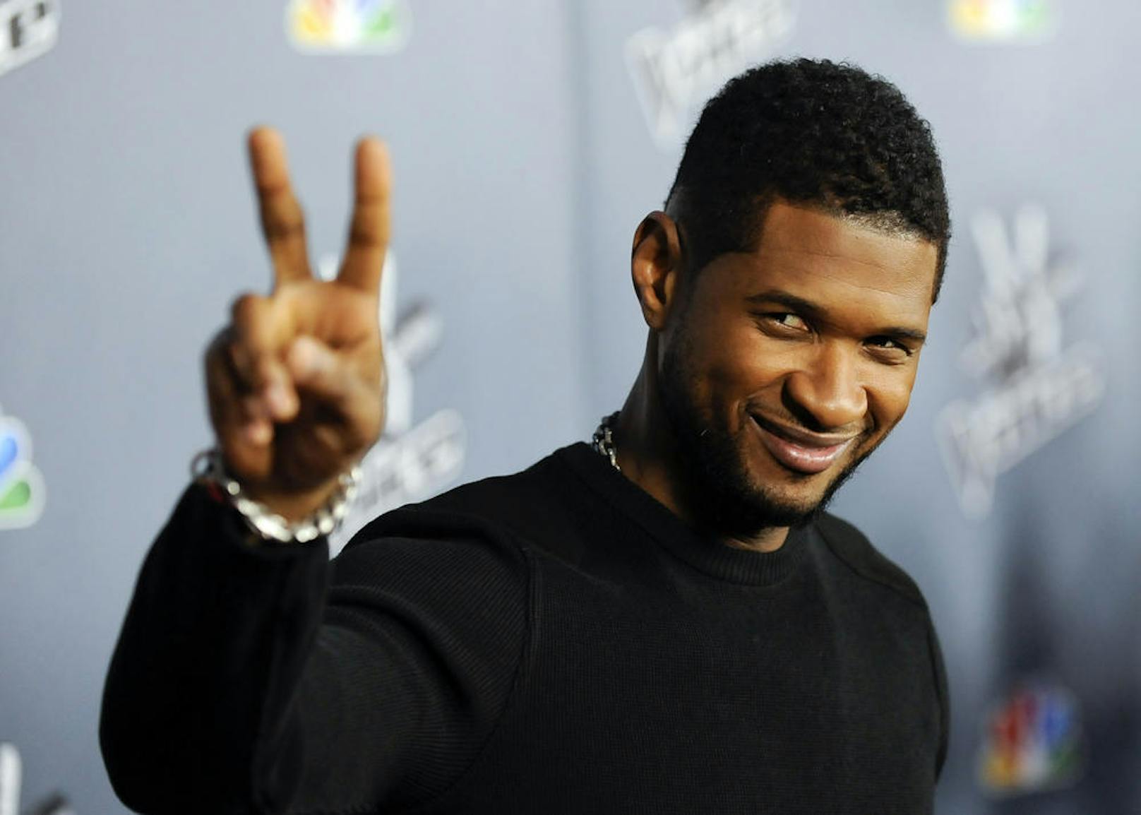 Usher bei der Premiere von "The Voice" Staffel 4 in Los Angeles, 2013.