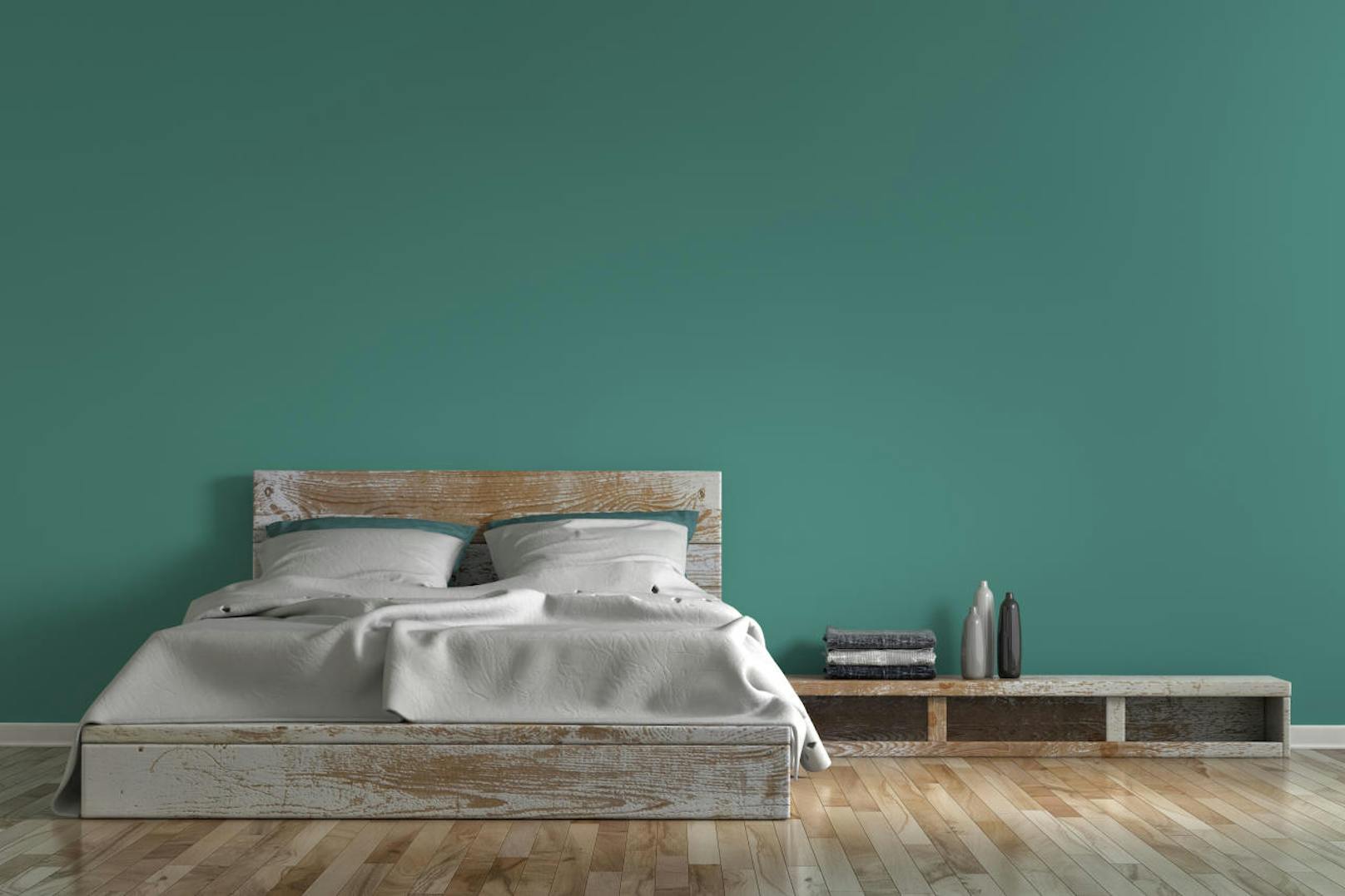 Je nach Farbton kann Grün wärmer oder kälter wirken und verleiht einem Raum so eine andere Ausstrahlung.
