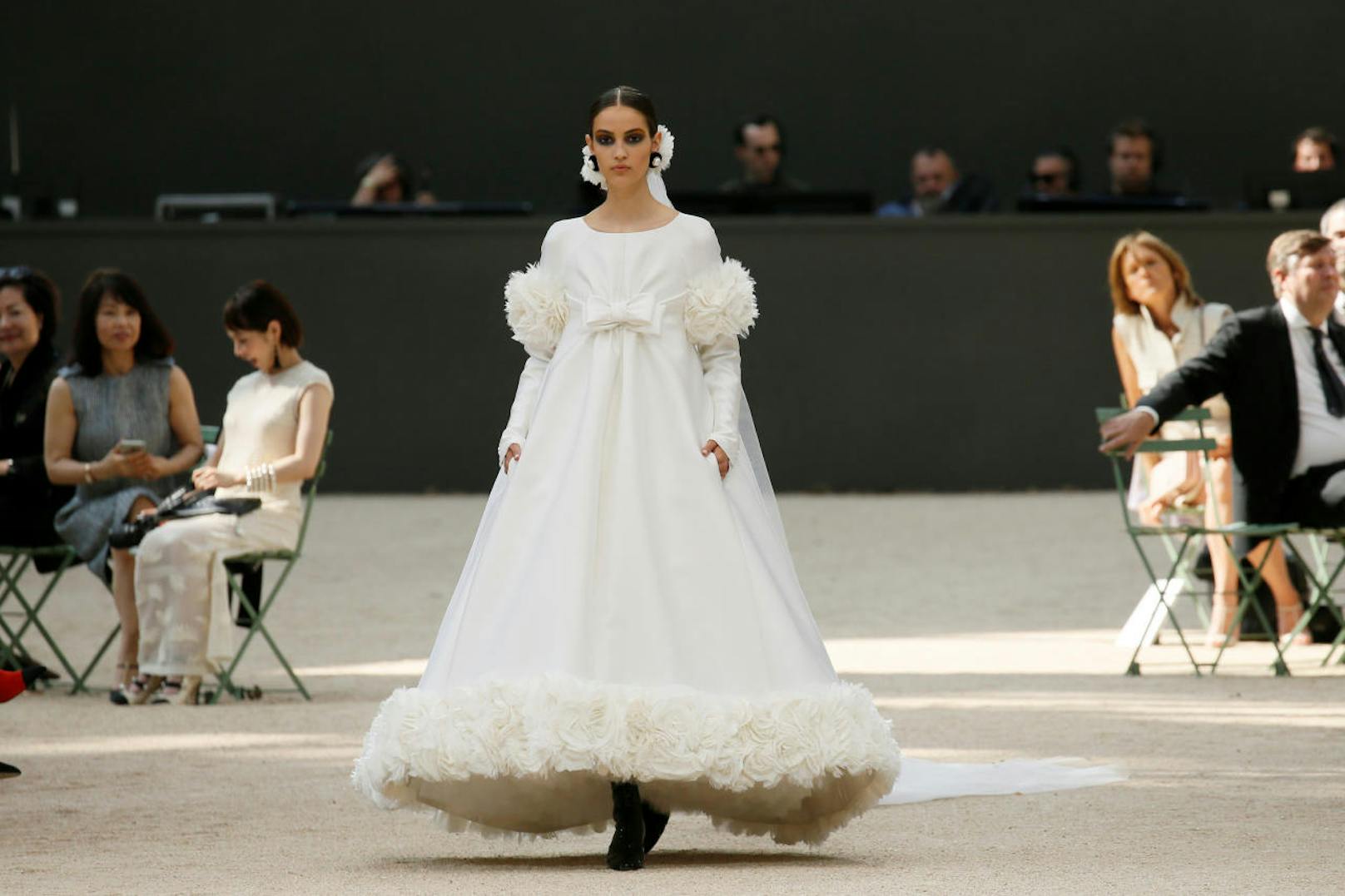 A model presents a creation by German designer Karl Lagerfeld as part of his Haute Couture Fall/Winter 2017/2018 collection for fashion house Chanel in Paris, France, July 4, 2017. REUTERS/Gonzalo Fuentes - RTX39YK6