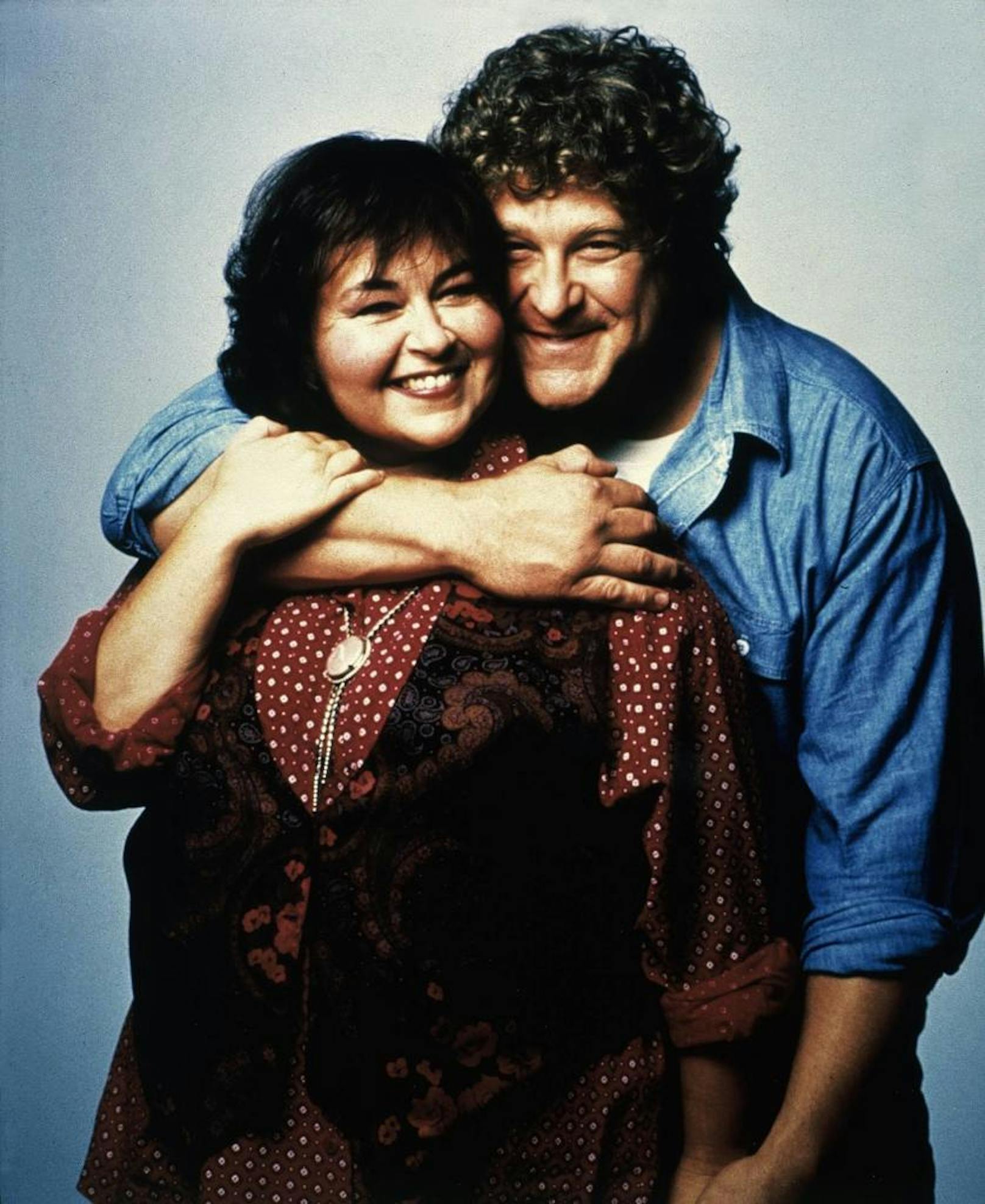 Roseanne, USA 1991: Dan (JOHN GOODMAN) und Roseanne (ROSEANNE BARR) 