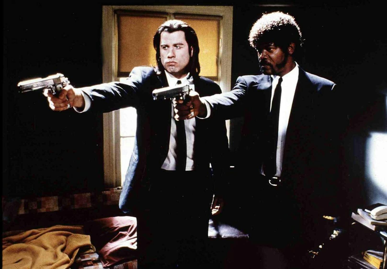 John Travolta (li.) und Samuel L. Jackson als Auftragsmörder in "Pulp Fiction"