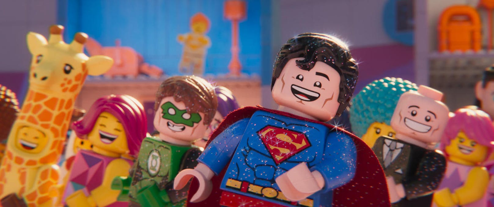 Glitzernd und dauerfröhlich sind Superman, rechts neben ihm sein Ex-Erzfeind Lex Luther und Green Lantern von der neuen Welt voll assimiliert