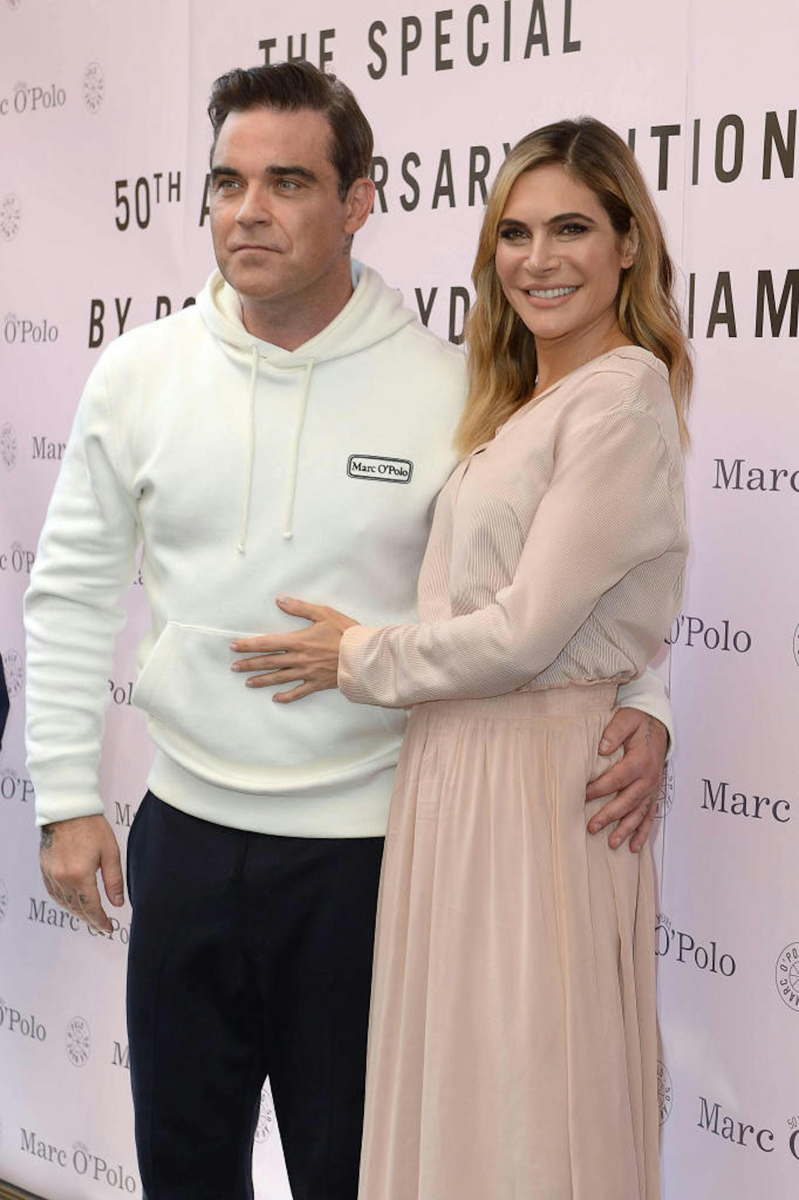 Robbie Williams mit Frau Ayda Field (2017 in München)