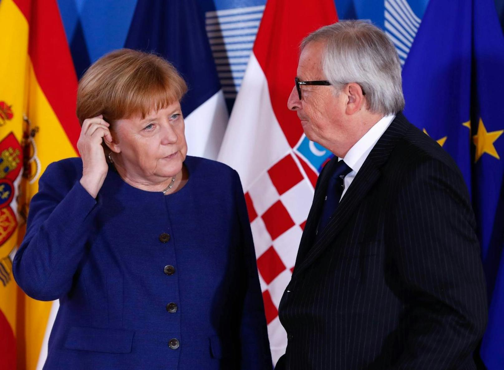 <b>Angela Merkel</b> und EU-Kommissionspräsident <b>Jean-Claude Juncker</b>.