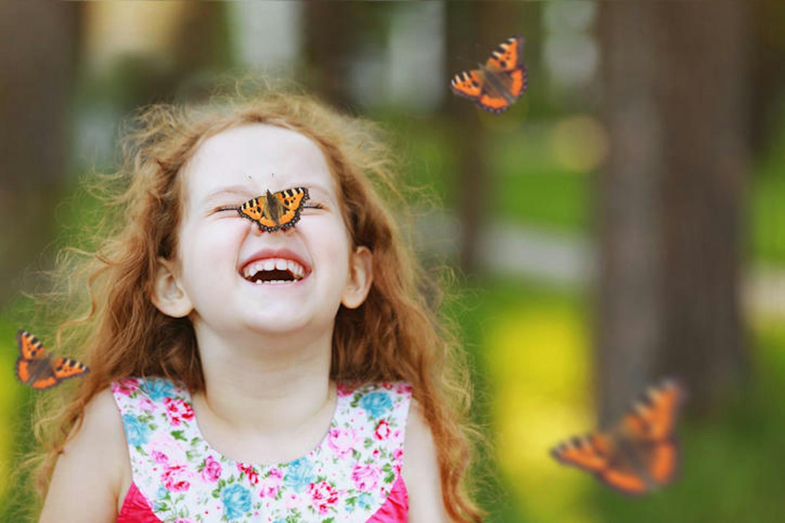 Funny laughing curly girl with a butterfly on his nose. Healthy smile with white teeth. Free breathing concept. (Funny laughing curly girl with a butterfly on his nose. Healthy smile with white teeth. Free breathing concept., ASCII, 112 components, 11