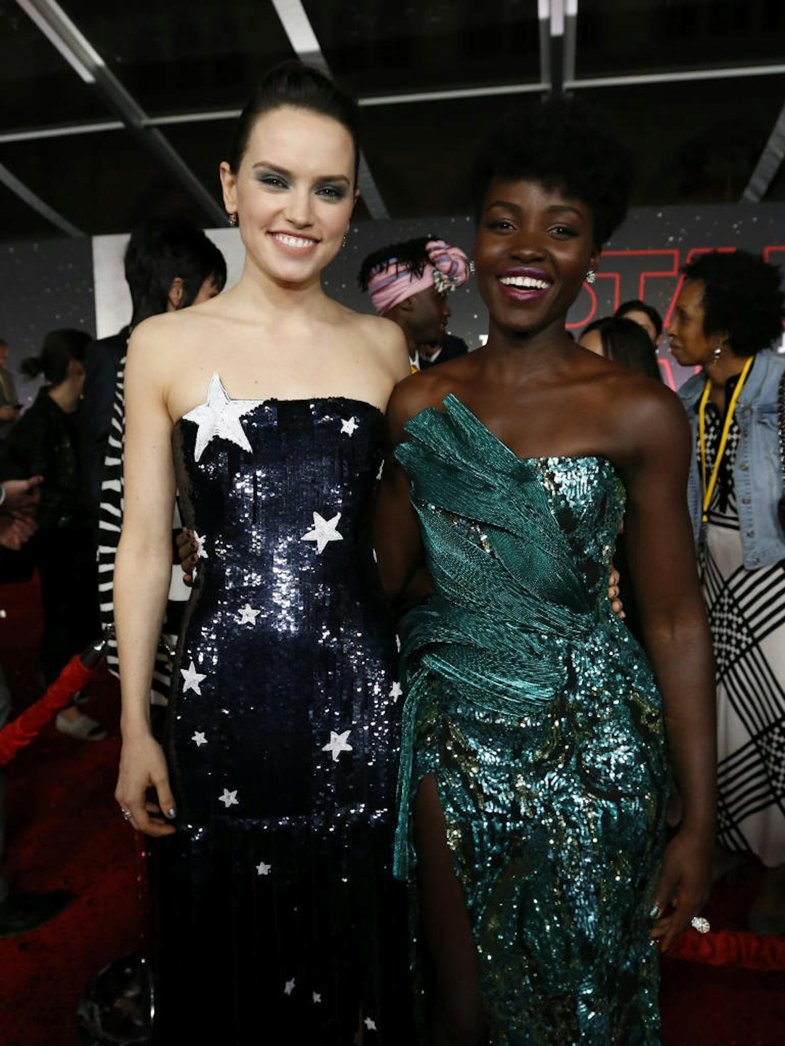 Daisy Ridley (L) and Lupita Nyong'o. 