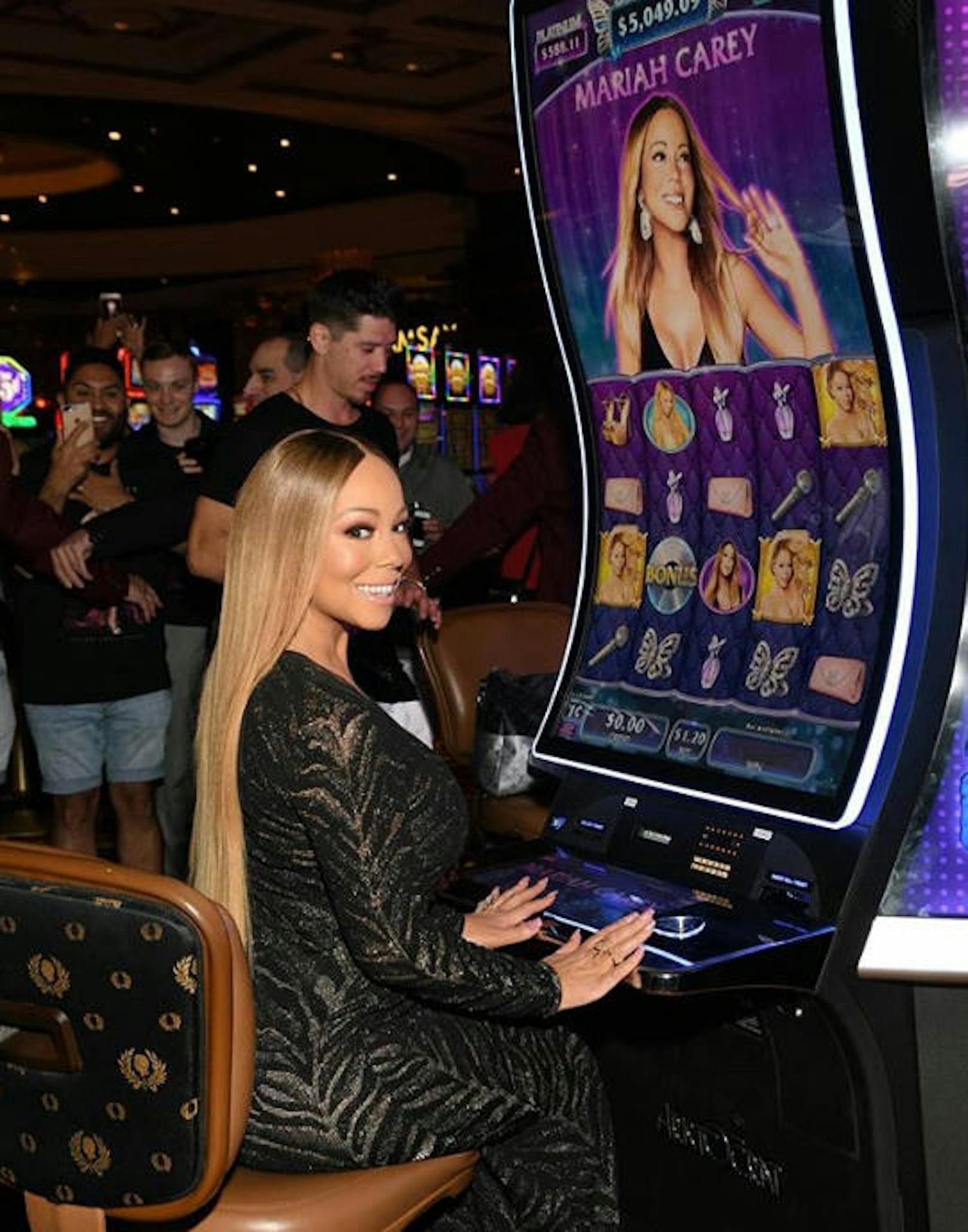31.8.2018: Win-Win für Mariah Carey: Gewinnt sie im Spiel, ist alles gut. Gewinnt die Bank, gehört das Geld ebenfalls ihr. Kein Wunder, dass sie grinst. 