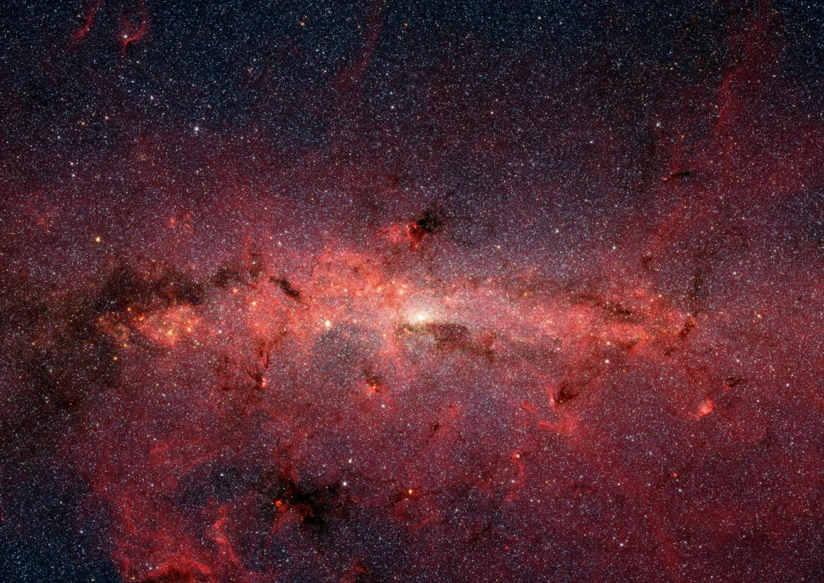 Infrarot-Aufnahme des Milchstraßen-Zentrums durch das Spitzer Weltraumteleskop.
NASA/JPL-Caltech/S. Stolvoy