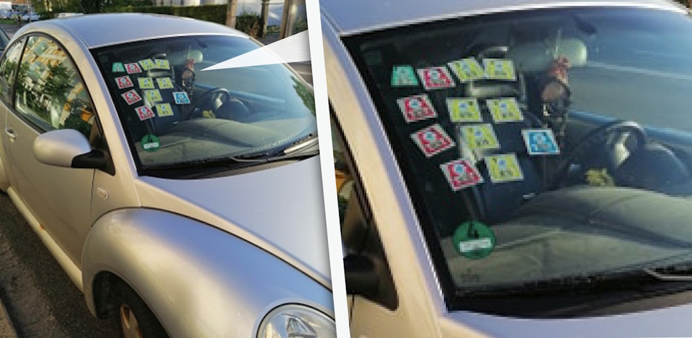 Direkt auf der Beifahrerseite kleben zwölf Vignetten auf der Windschutzscheibe.