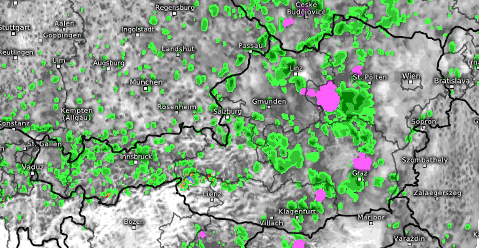 "Signifikantes Wetter" über Österreich. Prognose für 16 Uhr, Freitag. Die Karte zeigt Regen (grün) und Gewitter (pink).