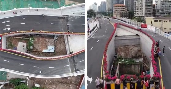 Das von einer Autobahnbrücke umringte Haus zieht Touristen an.