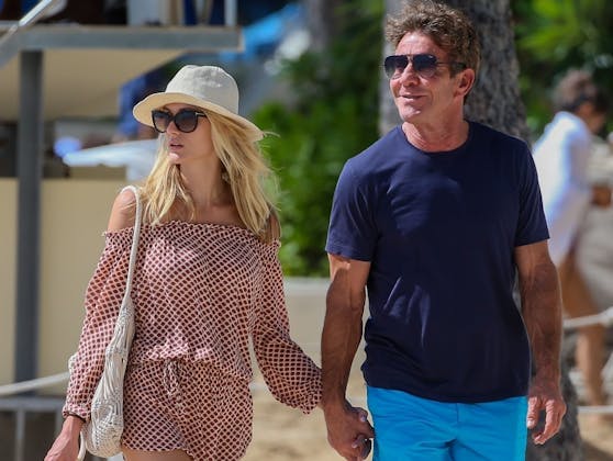 Der schwarze Kater wird das Familienleben von Hollywood-Star Dennis Quaid (re.) und seine Frau Laura Savoie bereichern.