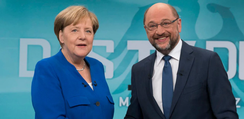 Angela Merkel und Martin Schulz werden nun doch über eine "GroKo" reden.