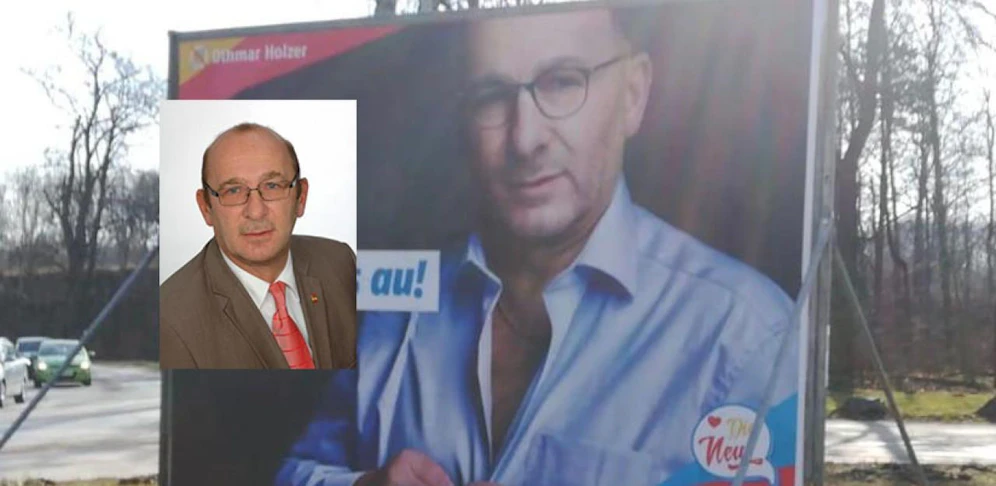 Othmar Holzer einmal mit Krawatte und auf Wahlplakat ganz leger.