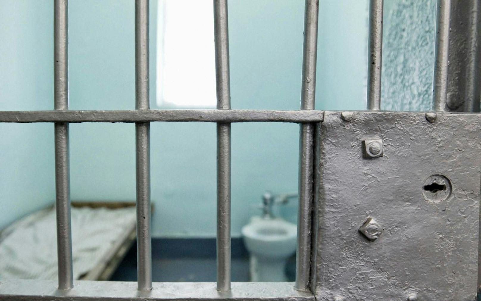 Jail cell with selective focus on bars. 