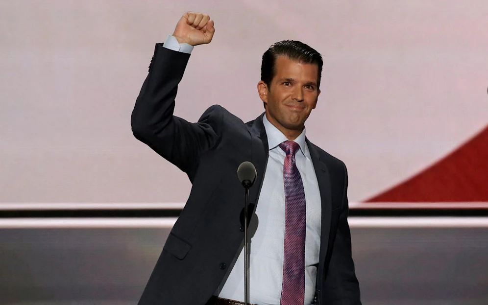 FILE PHOTO: Donald Trump Jr. thrusts his fist after speaking at the 2016 Republican National Convention in Cleveland, Ohio U.S. July 19, 2016.  REUTERS/Mike Segar/File Photo     TPX IMAGES OF THE DAY - RTX3B2F2