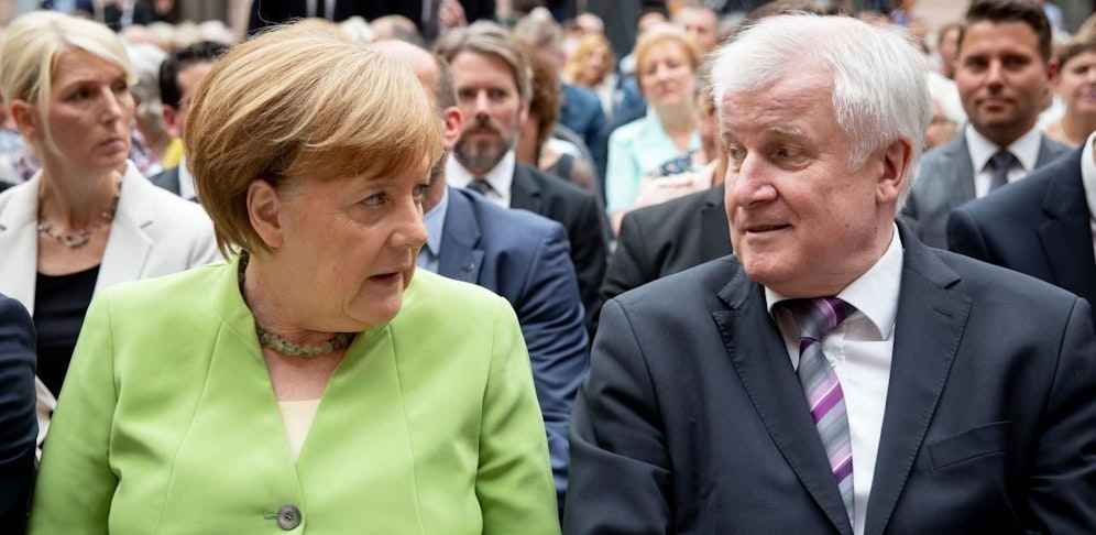 Kanzlerin Angela Merkel (CDU) und Innenminister Horst Seehofer (CSU)