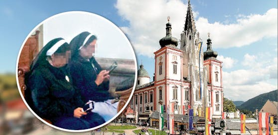 Nonnen mit Handy bei Messe und die Basilika im Wallfahrtsort Mariazell.
