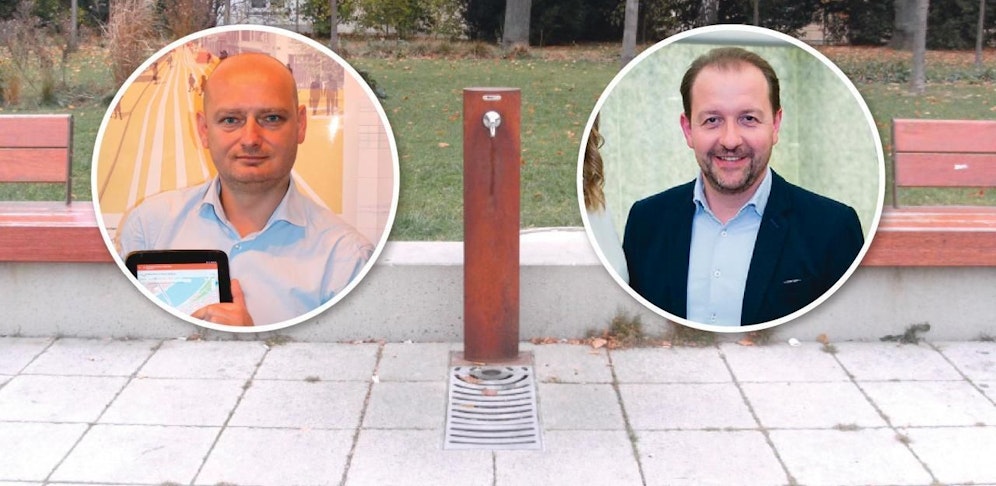 Bernhard Baier (re.) und Markus Hein (li.) streiten wegen der nicht funktionierenden Trinkbrunnen in Linz.