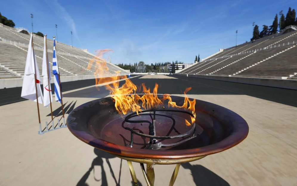 Die Entzündung des Olympischen Feuers.