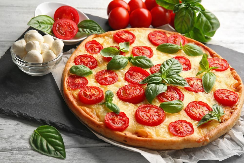 Pizza mit Tomaten – Life | Heute.at