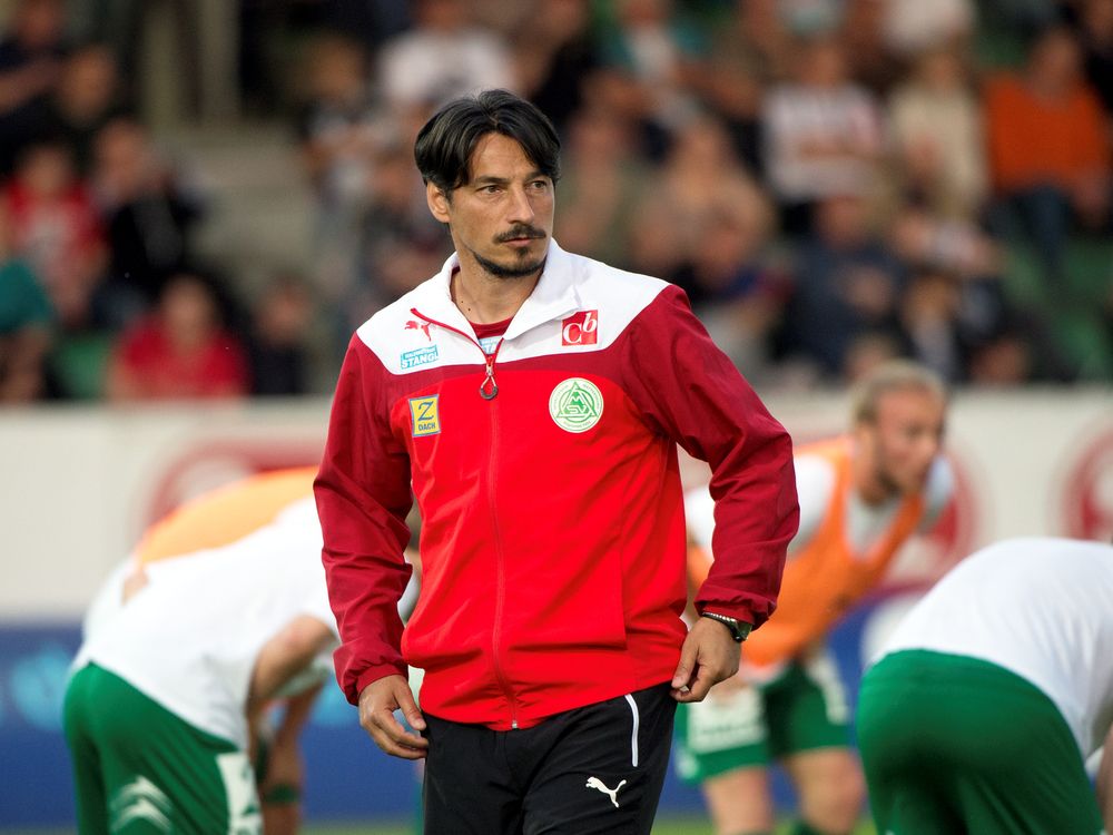  Ivica Vastic, former Austrian football player,  is pictured here coaching a soccer match.