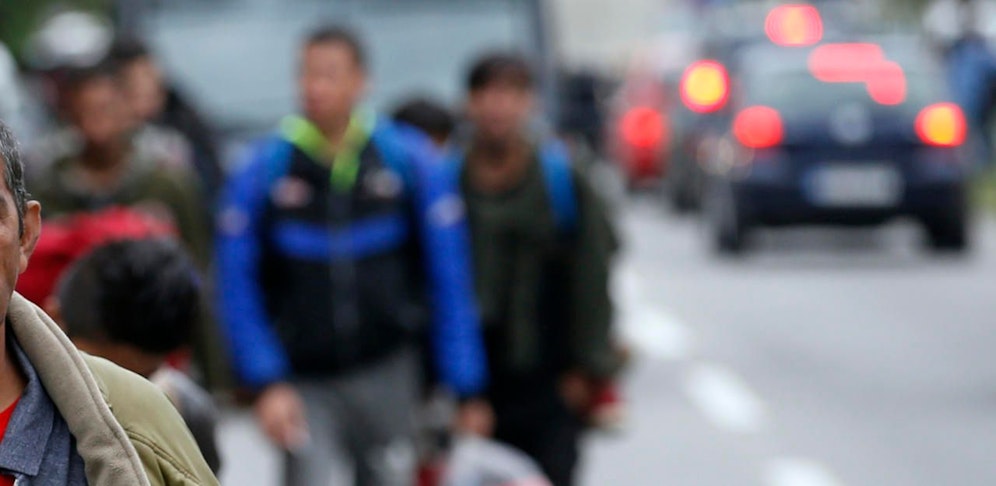 Symbolfoto von Migranten.