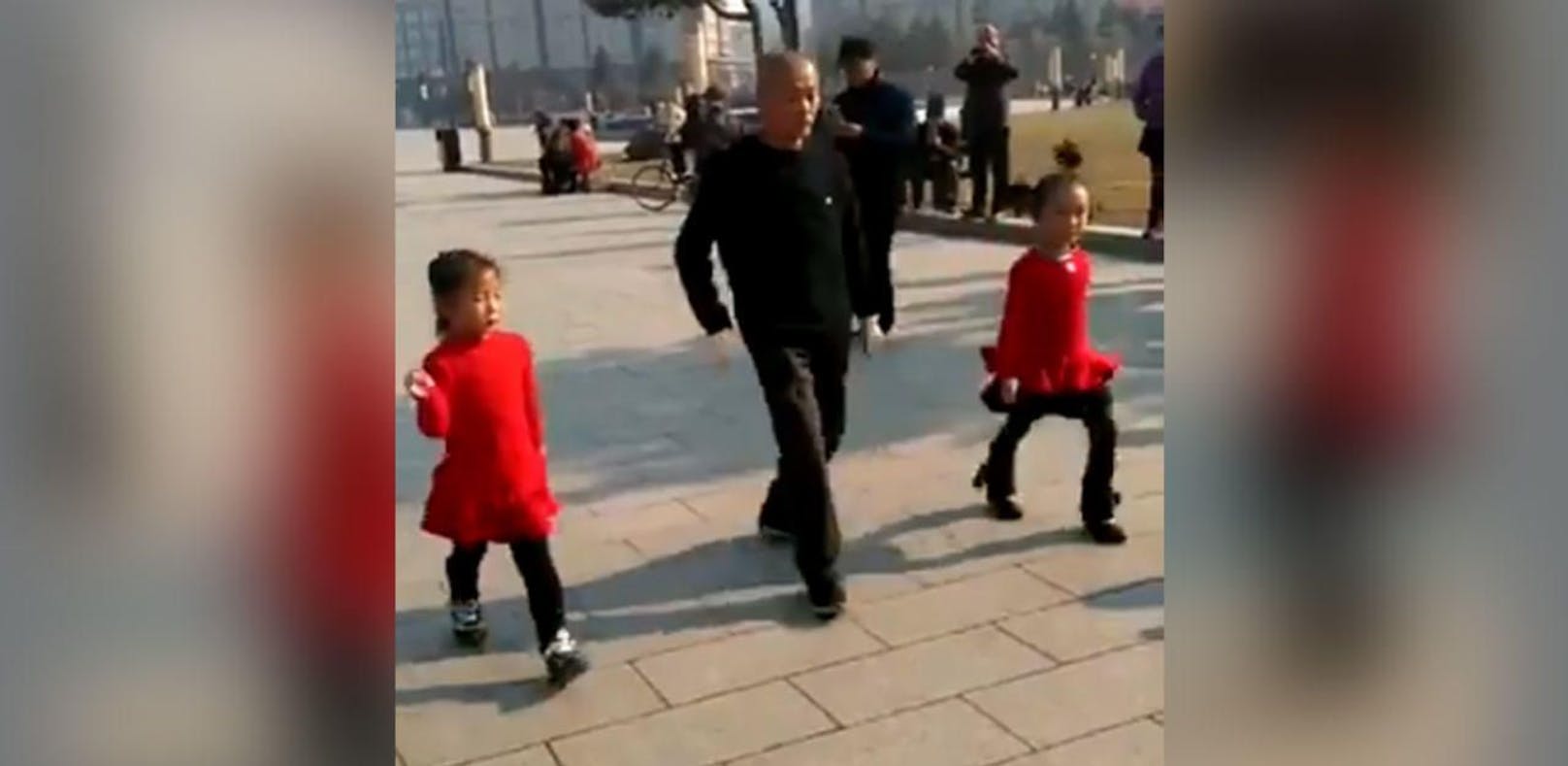 Ein chinesischer Großvater hat mit seinen beiden Enkeltöchtern eine geniale Tanzeinlage einstudiert.