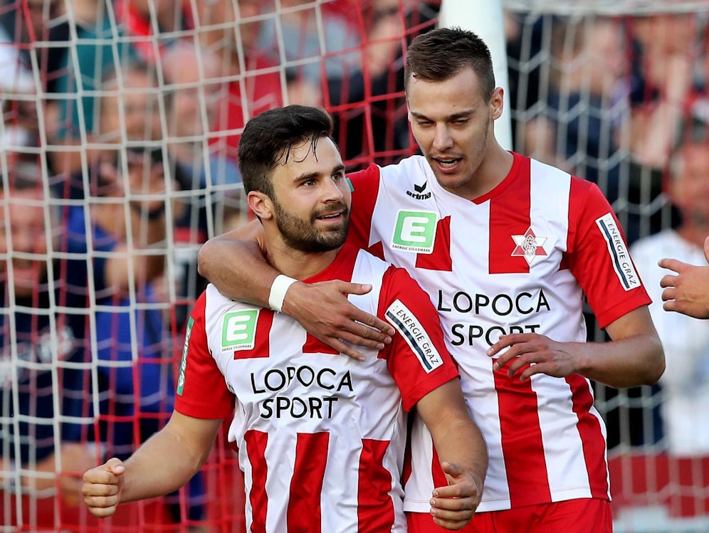 Dieter Elsneg (l.) war trotz Kreuzbandriss Matchwinner.