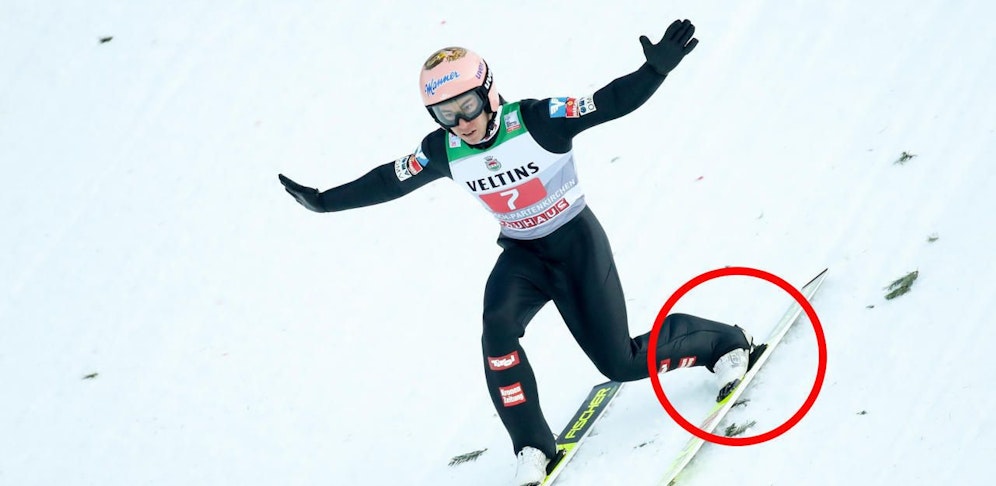 Stefan Kraft bei der Landung in Garmisch. Der Bindungs-Keil ist im Fokus der FIS.