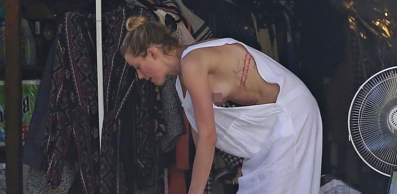 Heute.at - So sexy räumt Amber Heard die Garage auf