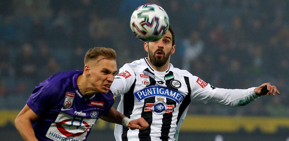 GRAZ,AUSTRIA,01.MAR.20 - SOCCER - tipico Bundesliga, SK Sturm Graz vs FK Austria Wien. Image shows Christoph Monschein (A.Wien) and Anastasios Avlonitis (Sturm). Photo: GEPA pictures/ David Rodriguez Anchuelo