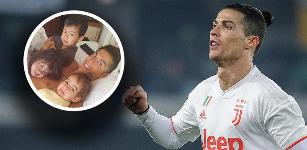 Cristiano Ronaldo kuschelt mit seinen Kindern. 