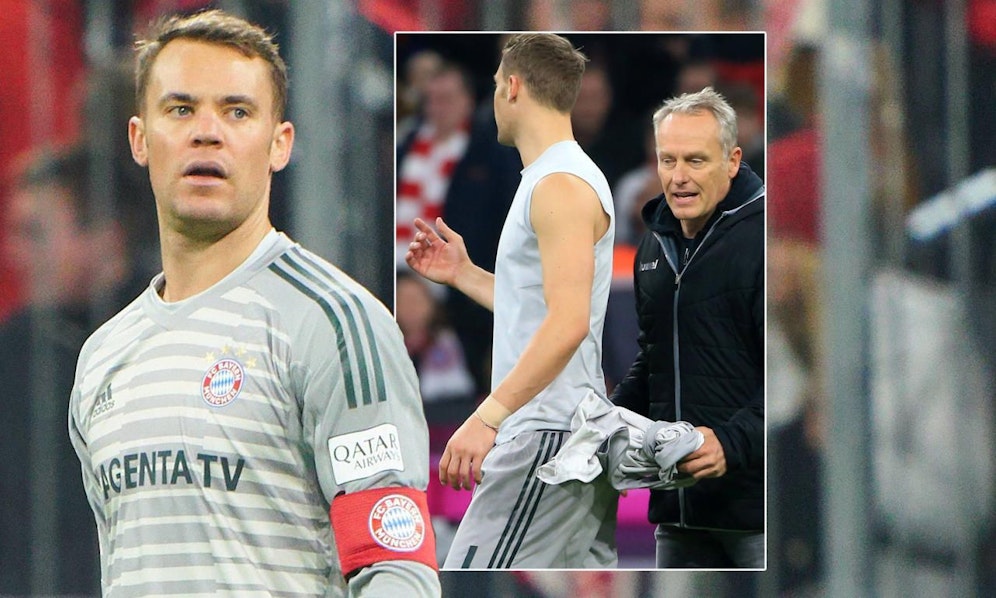 Christian Streich (r.) schnappte sich das Trikot von Manuel Neuer.