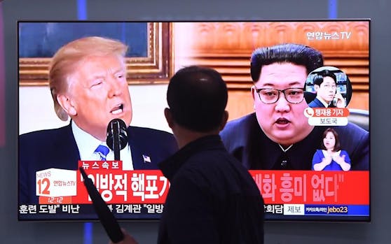 Nordkoread Diktator Kim Jong-un (R) und US-Präsident Donald Trump (L) in einem südkoreanischen Nachrichtenbeitrag.