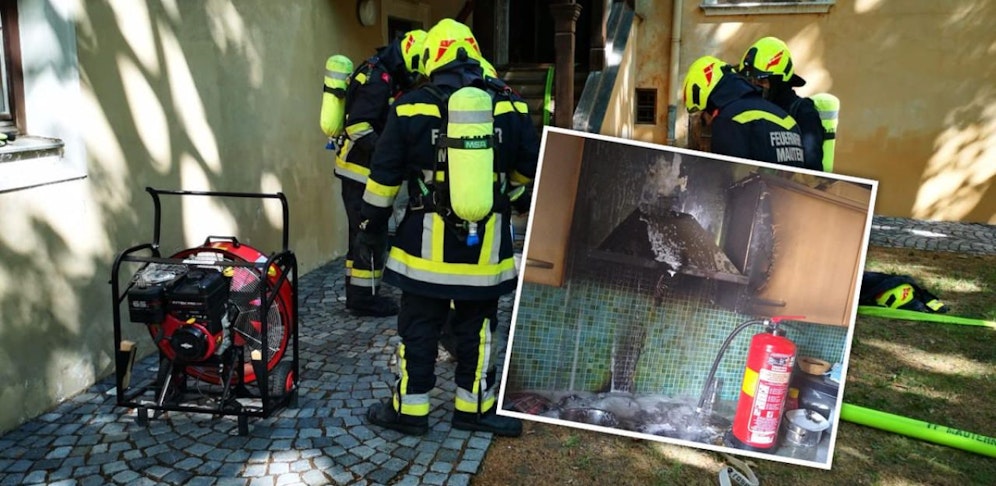 Brandherd und Feuerwehr im Einsatz.