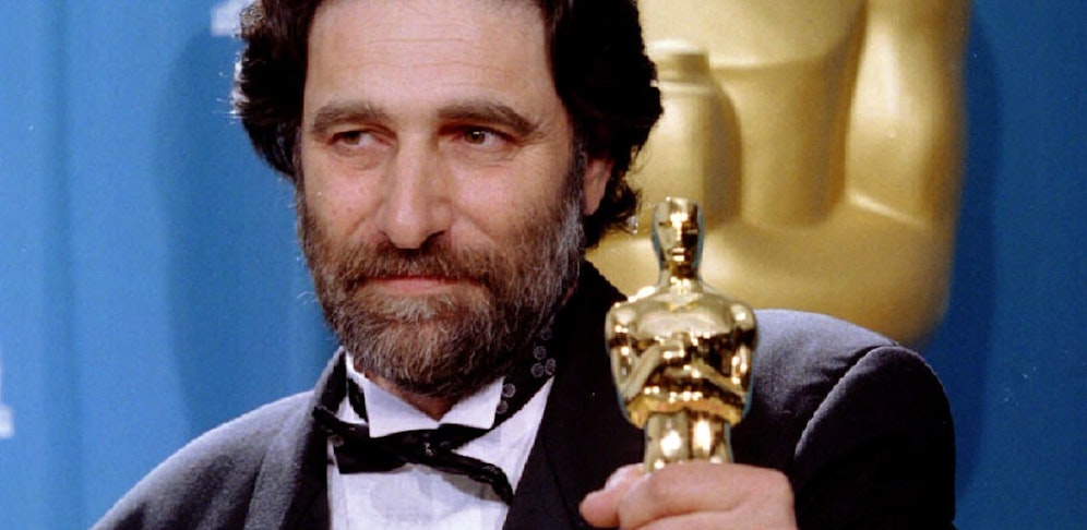 Eric Roth holds his Oscar for Best Adapted Screenplay March 27 during the 67th Annual Academy Awards at the Shrine Auditorium. Roth adapted the screenplay for "Forrest Gump", which swept the Academy Awards by winning a total of six Oscars - RTXG5N8