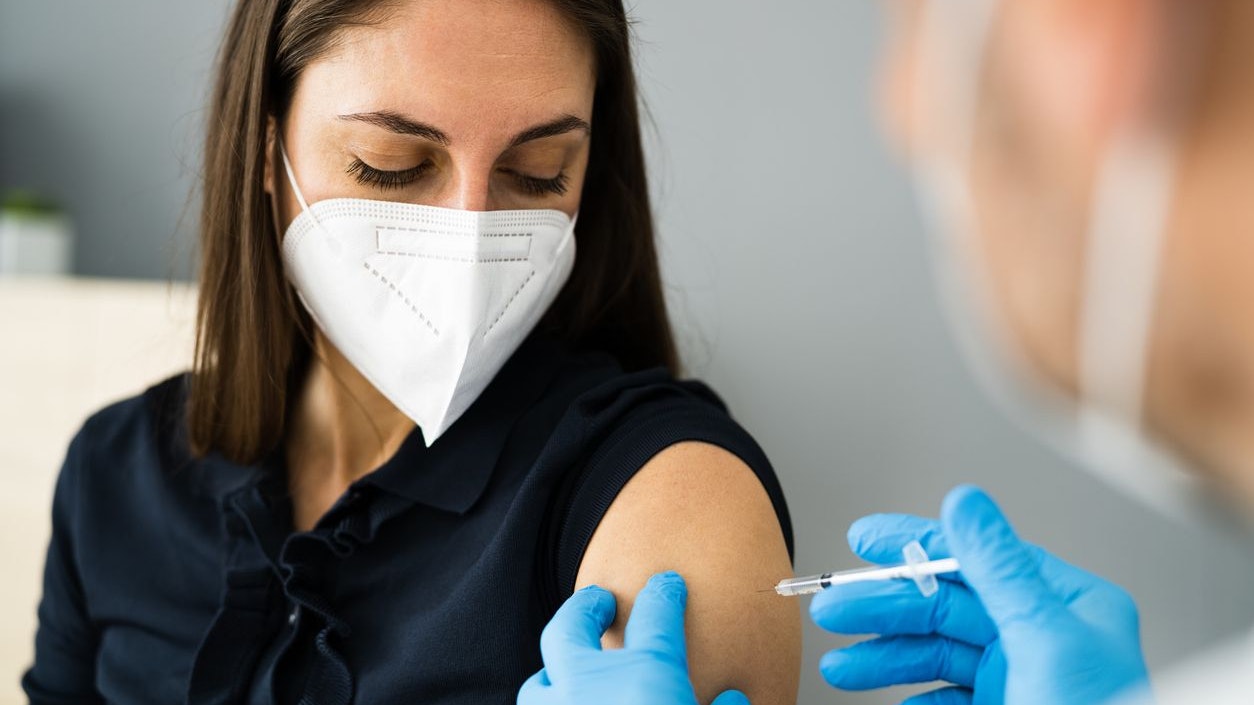 Covid Vaccine Injection By Doctor In Face Mask