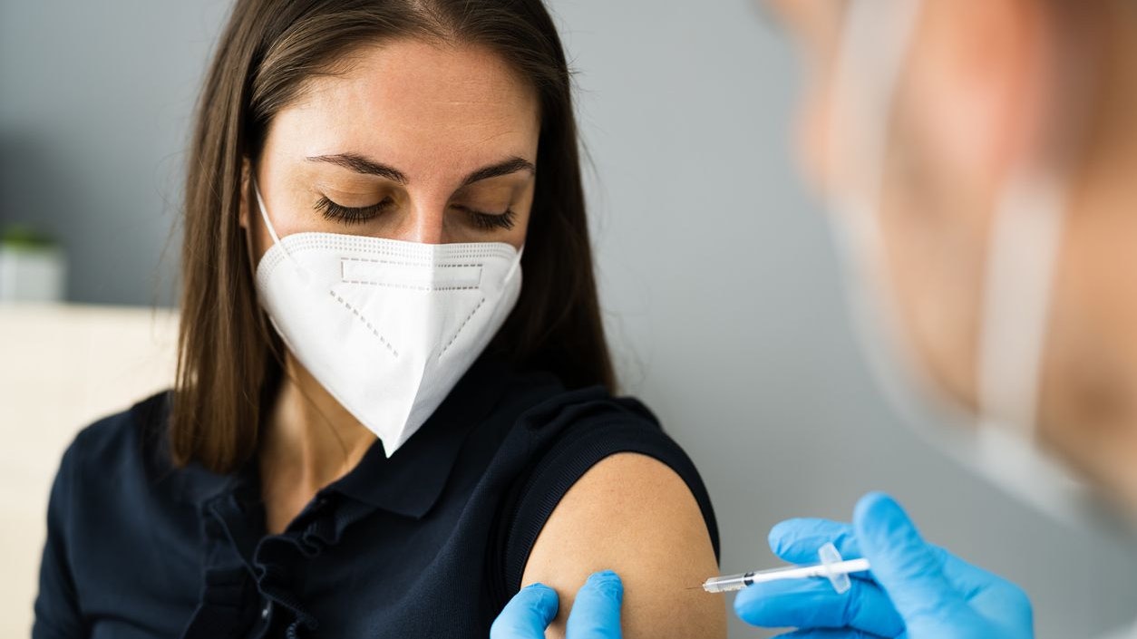 Covid Vaccine Injection By Doctor In Face Mask