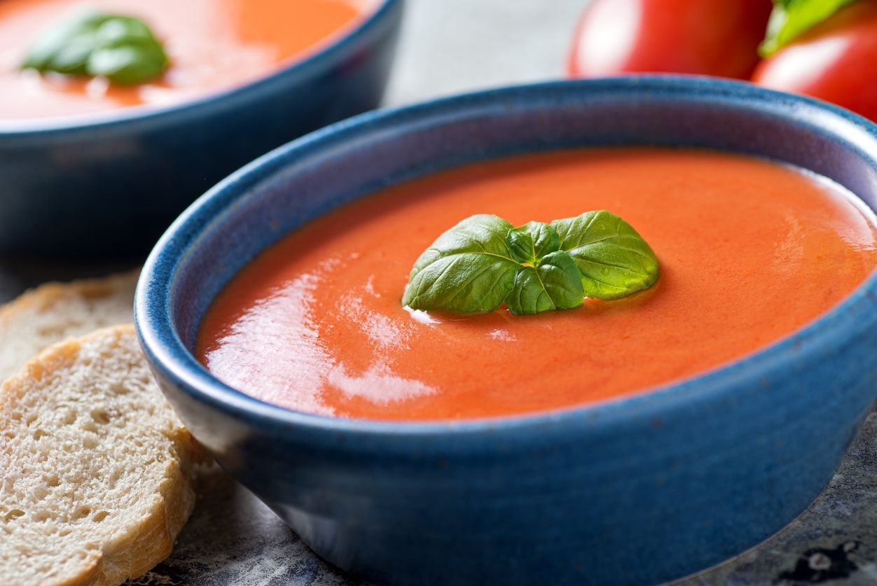 A bowl of delicious home made tomato basil soup.